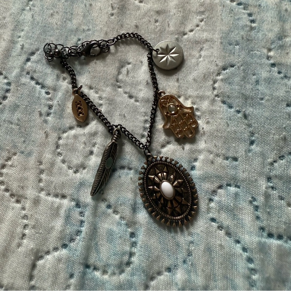 Elegant Multi-Charm Bracelet in Black and Gold - Picture 2 of 9